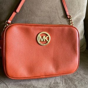 MK orange leather crossbody